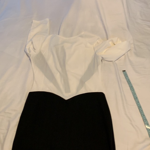 4 for $70.00. Knee length dress, Black & white, zipper detail, US size large. - Picture 7 of 7